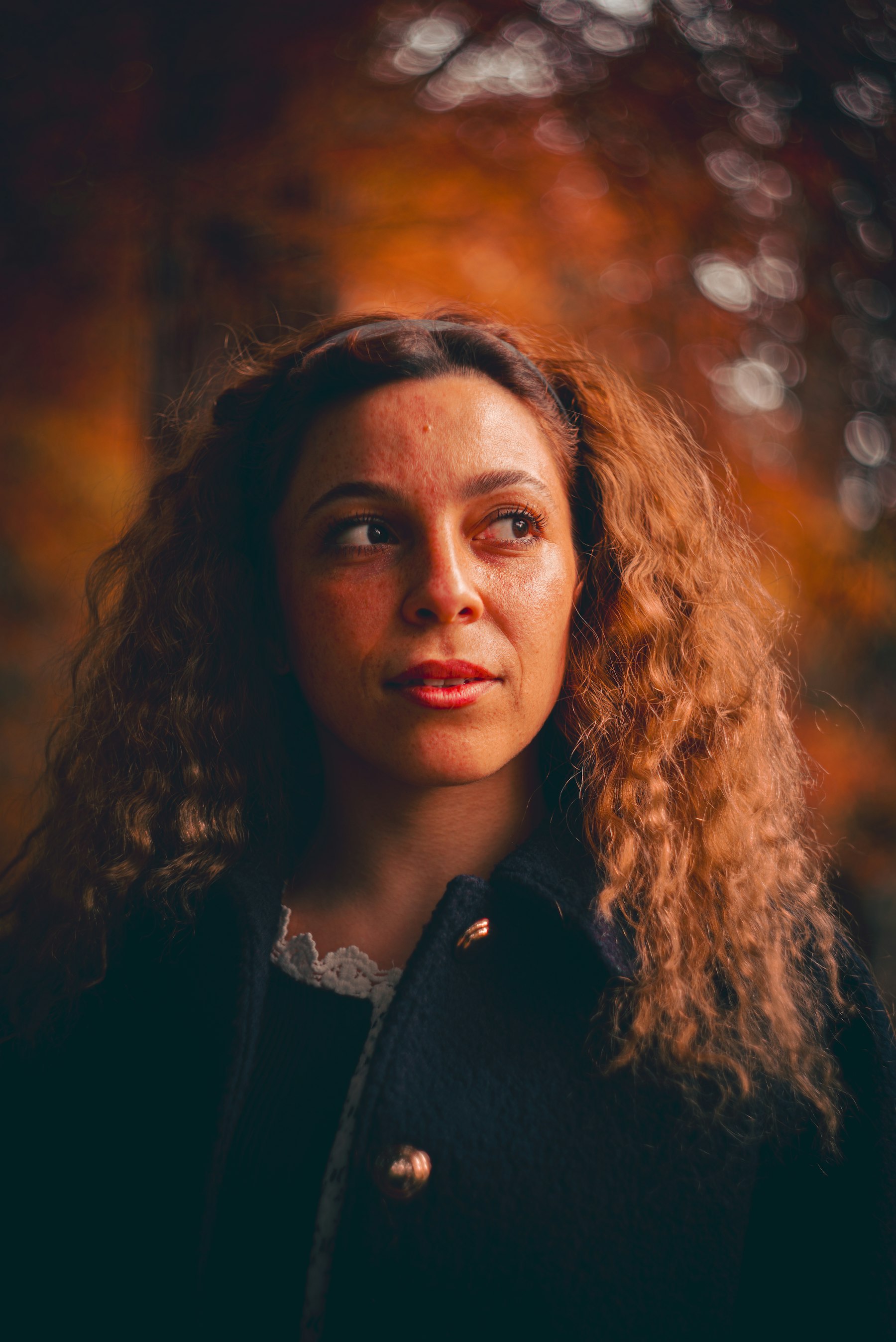 Warm-lit editorial photograph representing the founder of Bare Essence